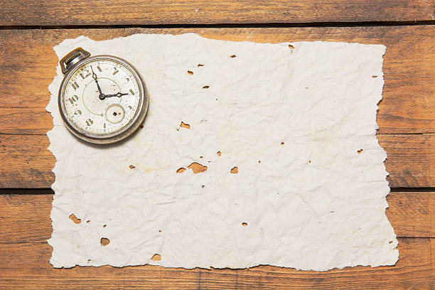 Time The old and broken pocket watch on the broken paper broken pocket watch stock pictures, royalty-free photos & images