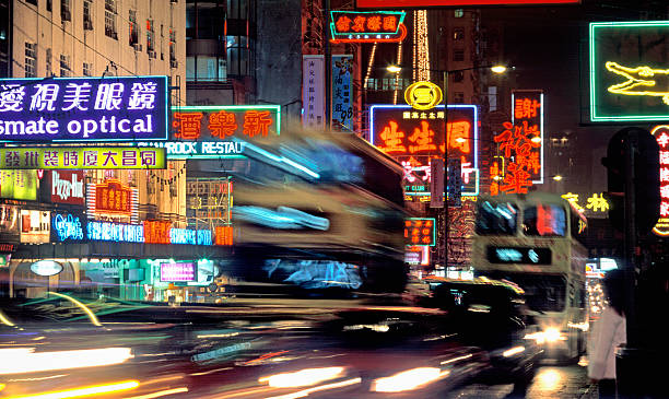 istock China neon signs night buses Hong Kong 515403493