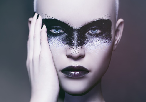 portrait of a fashion model and futuristic make up art 