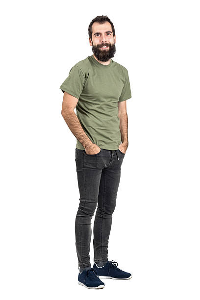 istock Happy smiling bearded hipster with hands in pockets 515436510