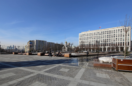 Moscow,  Russia - March 10, 2016: The building of the Ministry of Internal Affairs of the Russian Federation (It is written in Russian) . Zhitnaya St. 16, Moscow,  Russia. Near the building are located tourists and residents of the city