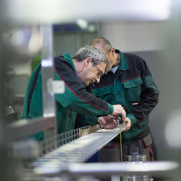 istock Industrial worker grinding in manufacturing plant. 515442074