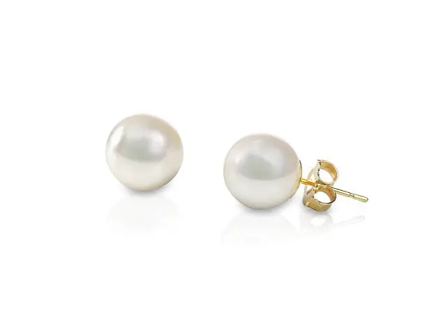 White pearl pieced earrings pair fine jewelry isolated on white