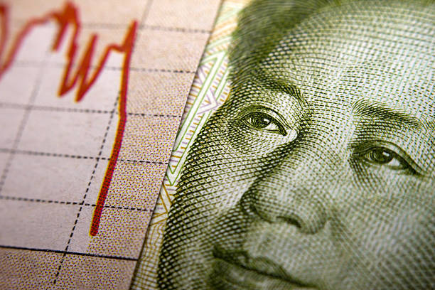 Stock Market Graph and Chinese banknote
