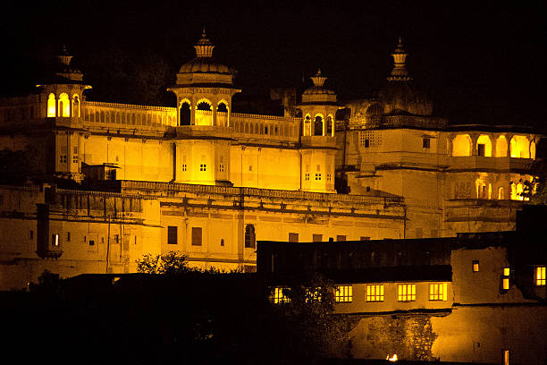 Udaipur, India.  January 20, 2012.  View of the City Palace while lit at night.