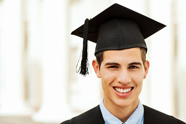 istock Male Student Wearing Mortar Board On Graduation Day 515449083