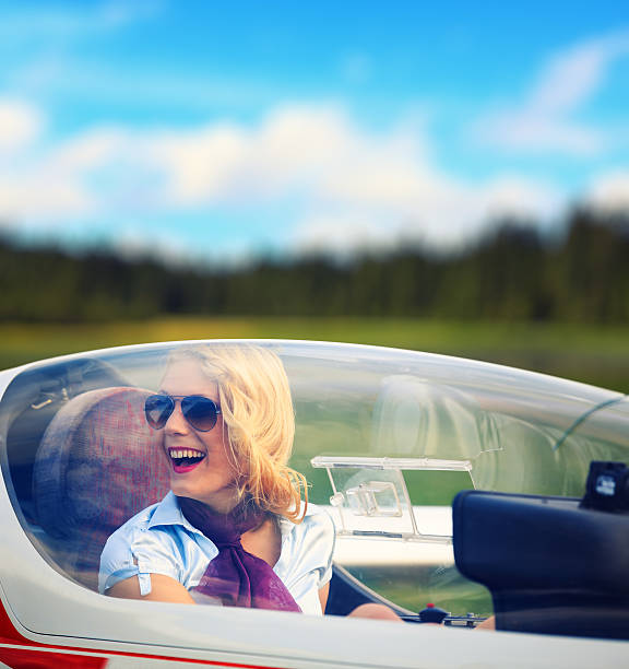 istock Young Woman In A Glider 515449739