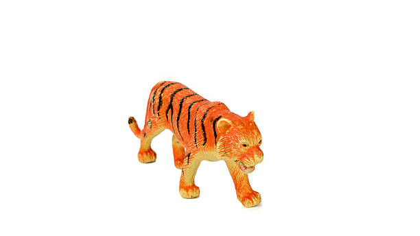 istock Toy plastic tiger. Isolated on white background. 515450249