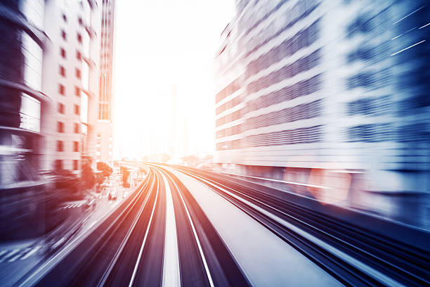 istock blur motion urban cityscape view from fast speed train 515450363