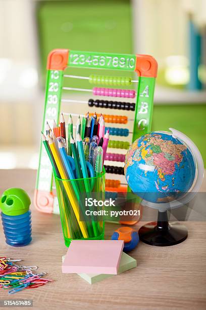 Abacusglobe Books And Pencils On Tableback To School Stock Photo - Download Image Now