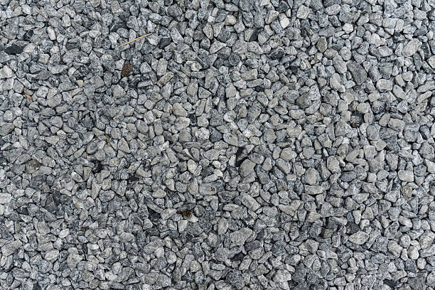 istock Mixed small gravels and asphalt stone 515451951
