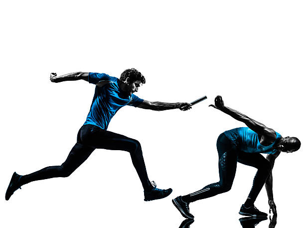 man relay runner sprinter  silhouette two men relay running sprinting in silhouette studio isolated on white background relay photos stock pictures, royalty-free photos & images