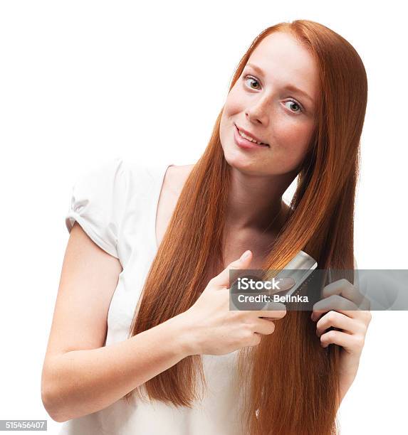 Young Redhaired Girl Combing Her Long Hair Stock Photo - Download Image Now - Adult, Adult Student, Beautiful People