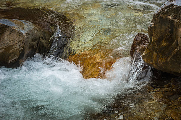 istock River with colored stones and hot springs in Loutra Pozar 515480502
