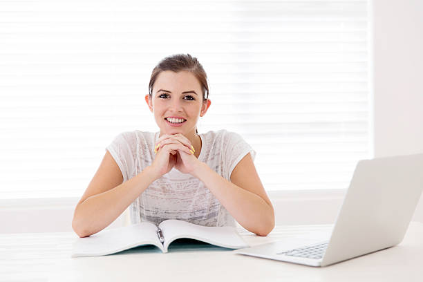 istock college student relaxing at home 515482118