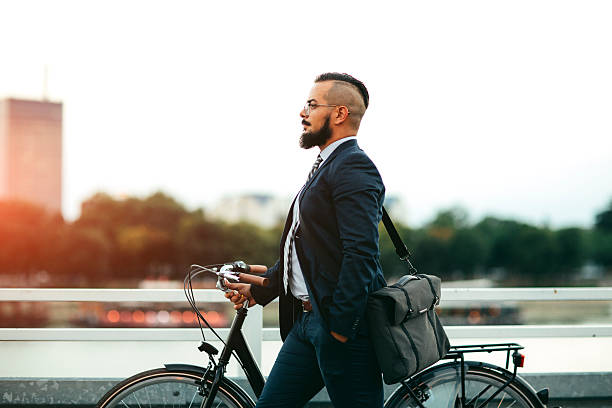 istock Businessman Push Bicycle Outdoors. 515484746