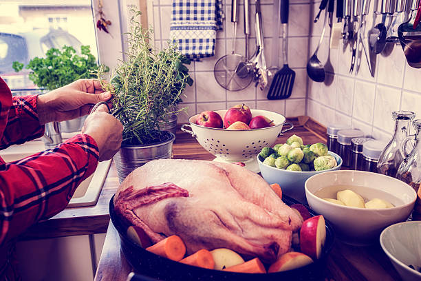 istock Preparing Traditional Holiday Goose with Side Dishes 515515995