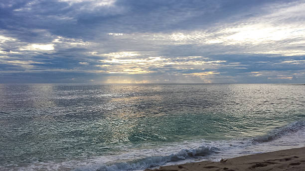 istock Anse Georgett sea surfase in cloudy weaher. 515516565