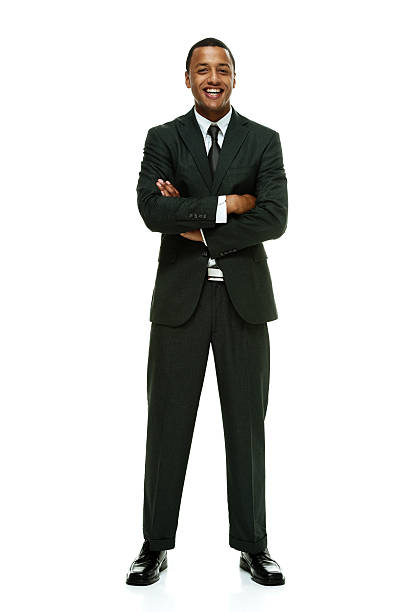 istock Cheerful businessman standing with arms crossed 515517139