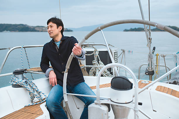 istock Man sat relaxing on a luxury yacht 515518350