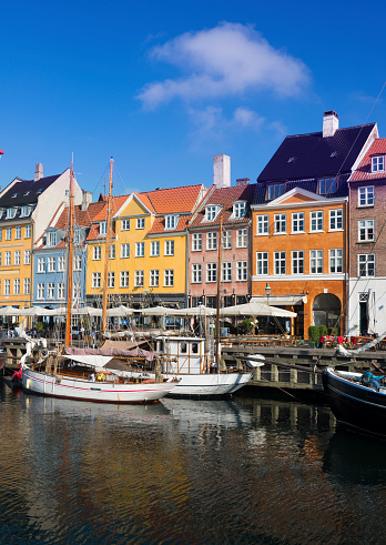 Copenhagen Nyhavn panorama city crowds of people with boats and many small colorful houses