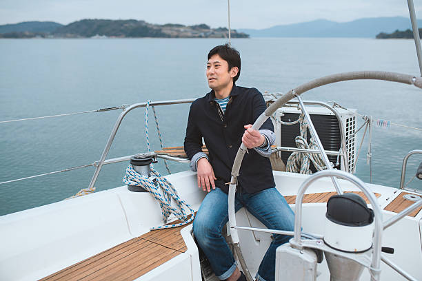 istock Man sat relaxing on a luxury yacht 515518432