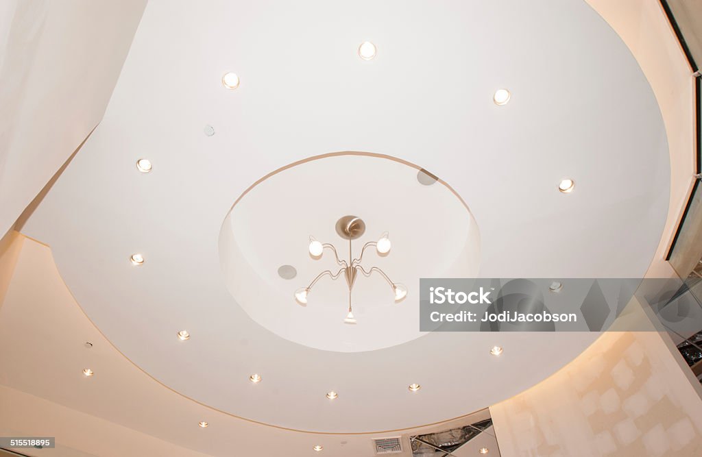 Ceiling and lighting in a retail store being built The ceiling of a retail store in the process of being built.  rr Architecture Stock Photo