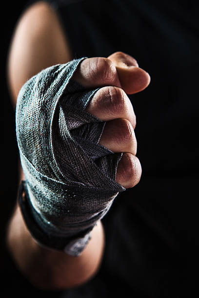istock Close-up hand of muscular man with bandage 515519548