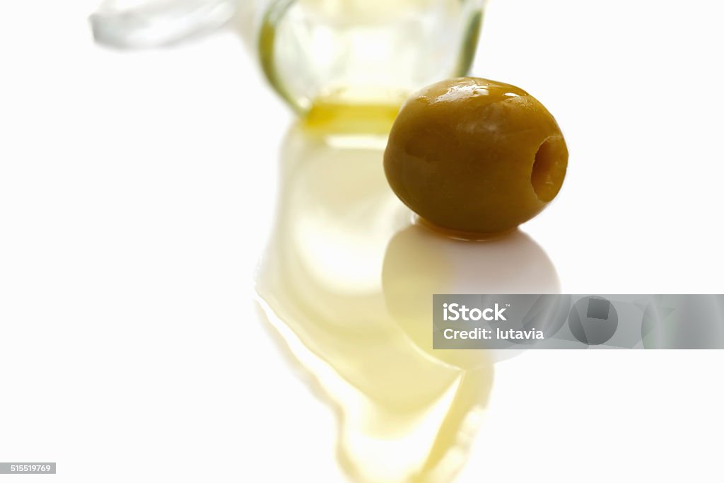 olive oil with olives olive oil with olives on white background Close-up Stock Photo