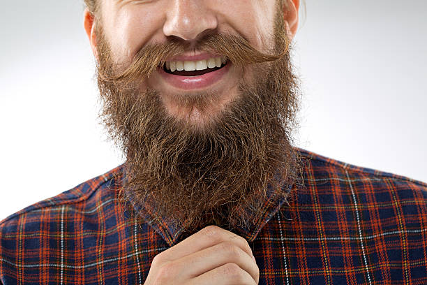 istock portrait of young man with long moustaches and beard 515520007