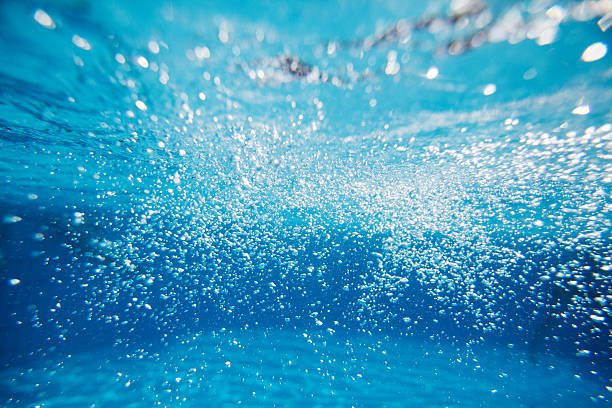 istock bubbles of water on blue background 515521270