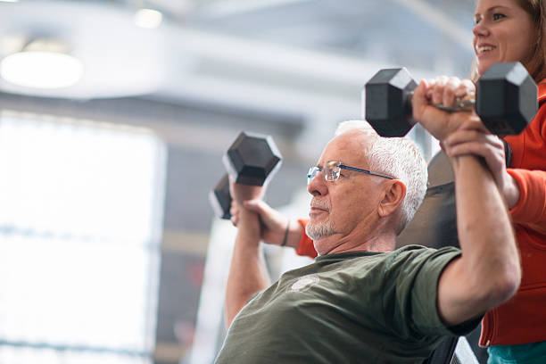 istock Learning How to Lift Weights with a Personal Trainer 515521738