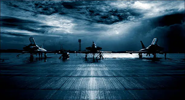 Royal Air Force RAF Typhoon Eurofighter, runway, dramatic stormy clouds.