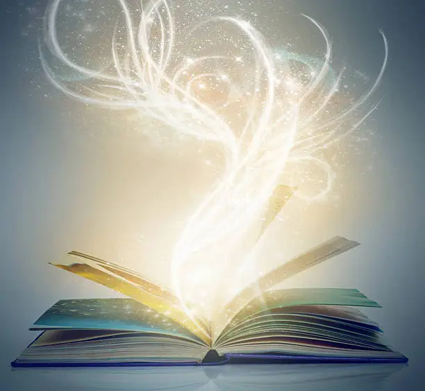 A book on an isolated background with a bright,magical glow emanating from it