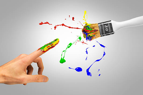 istock Miracle creation of creative man by colorful paintbrush 515523280