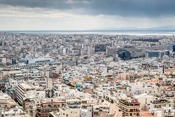 istock city landscape with dramatic sky, clouds and mountains 515524278