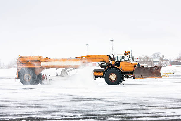 istock Airfield sweeper cleans the Runway 515525046