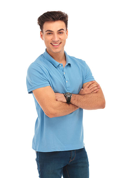 istock young man in blue shirt posing with arms crossed 515526590