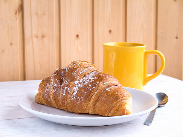 istock Continental breakfast on the white wooden table 515526848