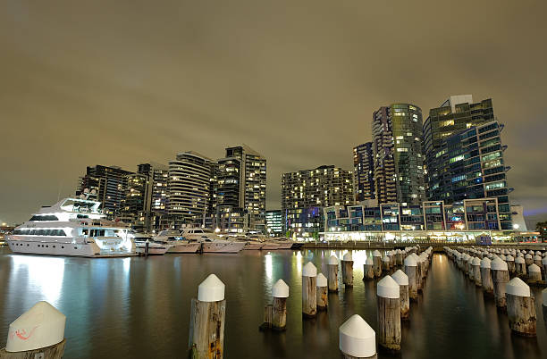 Dockland Pier, Melbourne, Australia - August 07, 2015: The towers and Pier in Docklands. A view was taken from Dockland Pier at night.