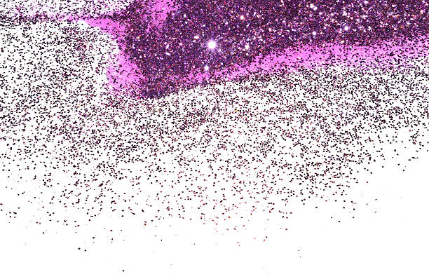 istock Blurry background of purple glitter sparkles on white surface 515530586
