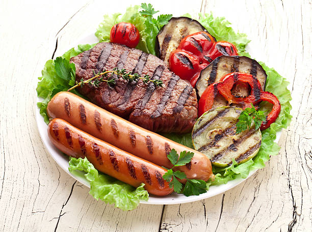 istock Grilled steak,sausages and vegetables. 515532666