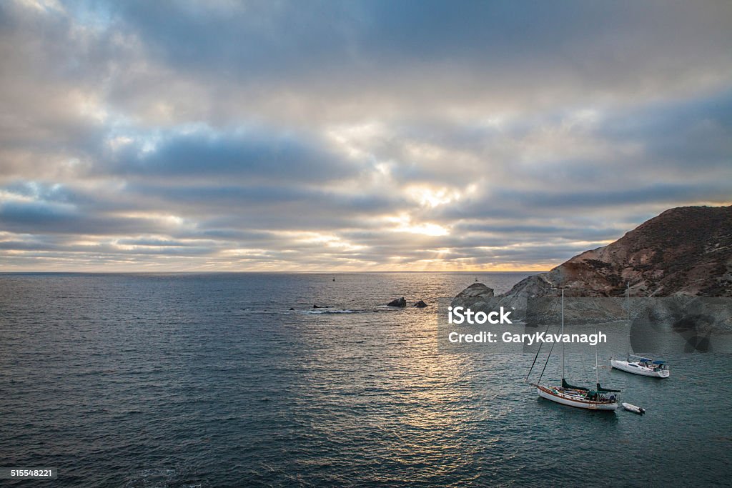 Sailboats anchored at Little Harbor during sunset, Catalina Island, California Sailboats anchored at Little Harbor during Sunset, along the southern coast of Catalina Island, California. California Stock Photo