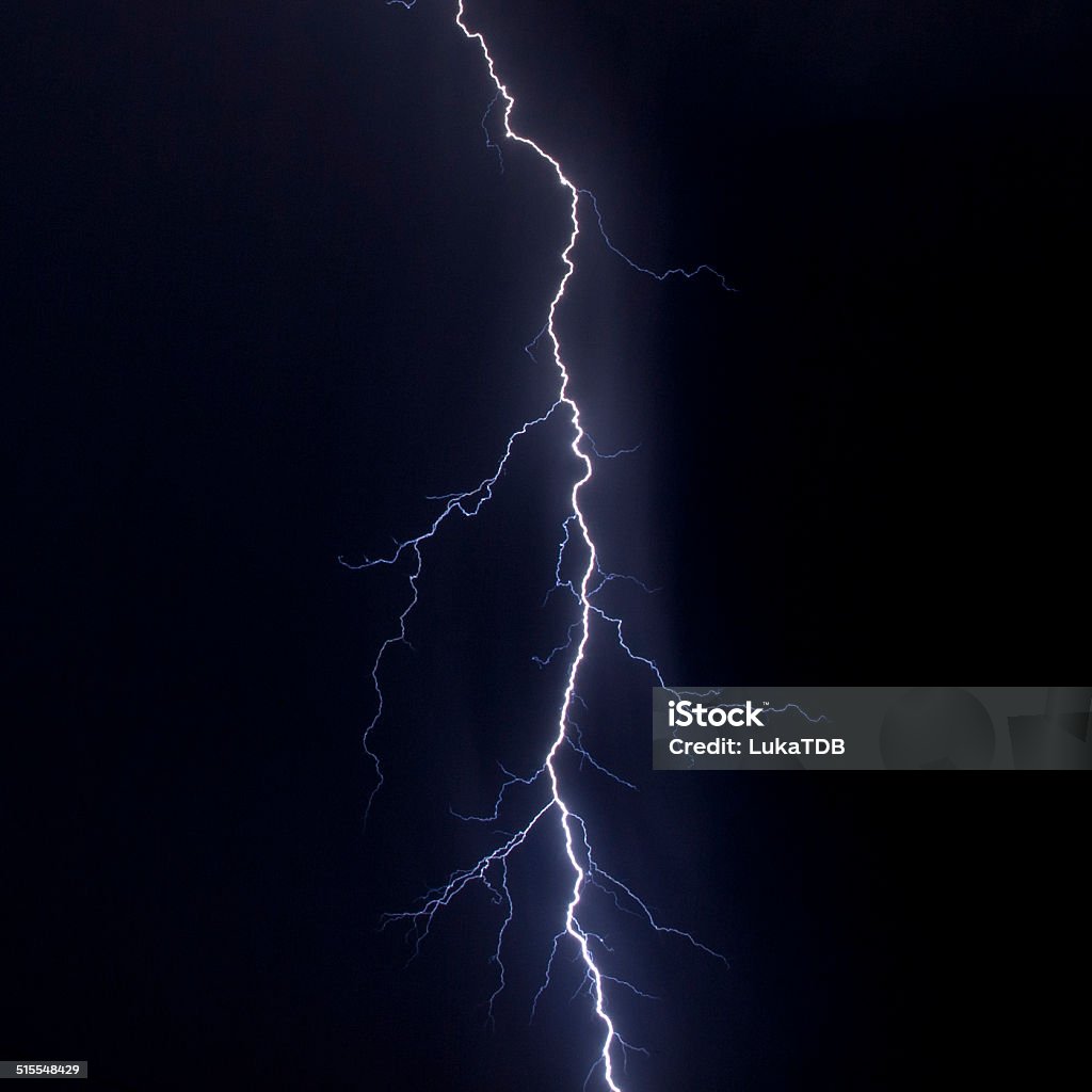 Lightning strike over night city Lightning Stock Photo