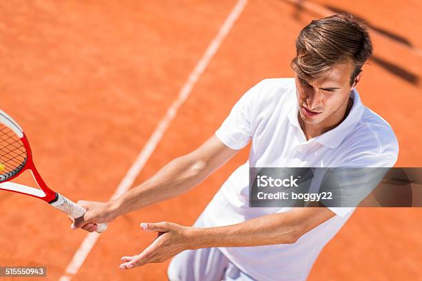 Young Man Playing Tennis Stock Photo - Download Image Now - Activity, Adult, Adults Only