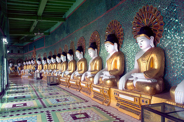 istock Row of Buddhas in U Min Thonze cave ,Myanmar. 515551985
