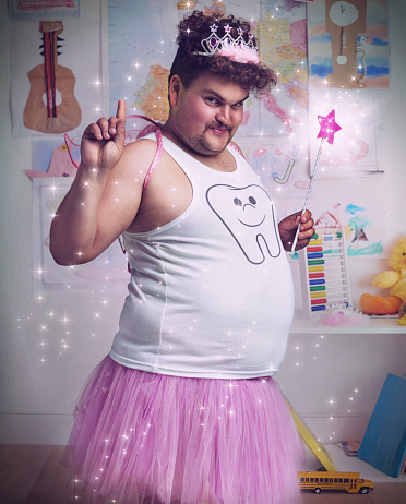 An overweight man dressed as the tooth fairy