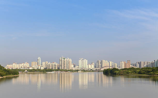 istock modern city near the river 515579243