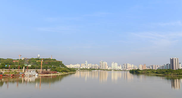 istock modern city near the river 515579247