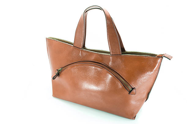 istock Nice elegant leather woman bag isolated on the white 515580455